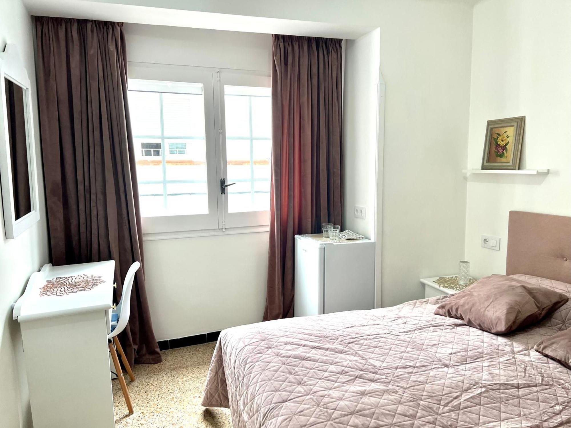Escondite Central Con Terraza Compartida En La Azotea โรเซส ภายนอก รูปภาพ